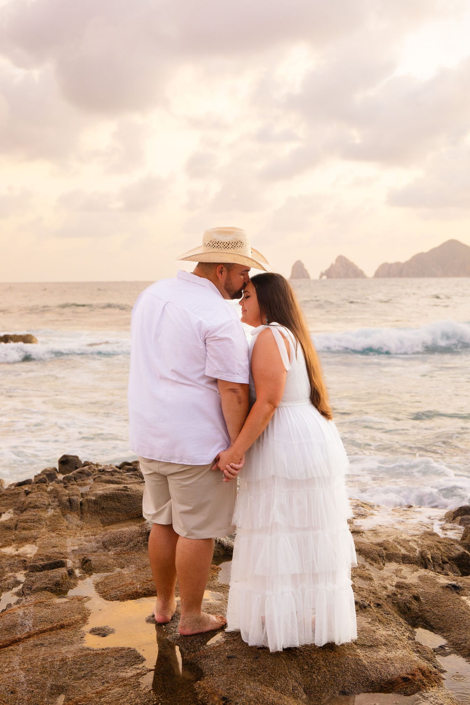 engaged couple on beach in Cabo San Lucas