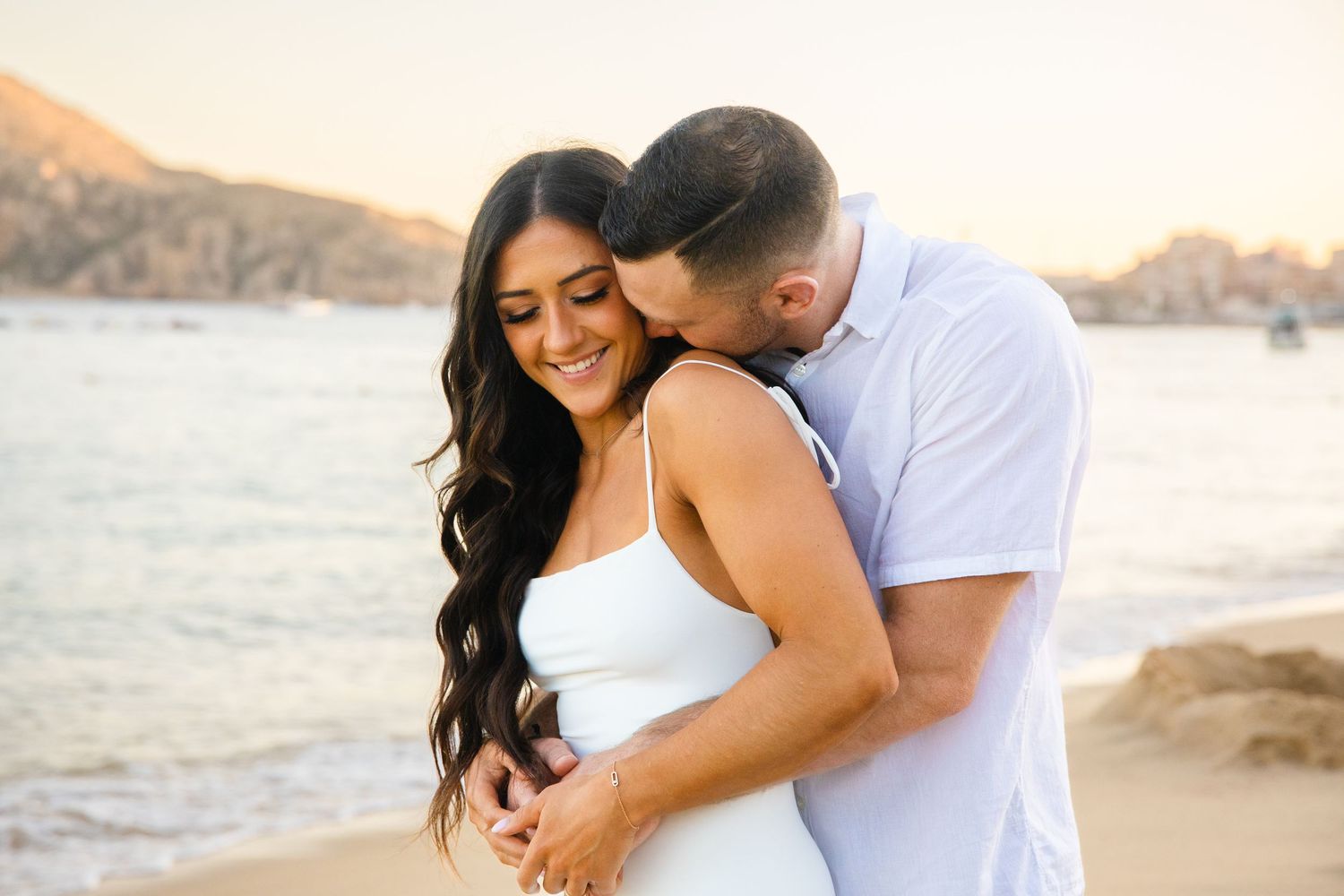 engaged couple on beach in Cabo San Lucas
