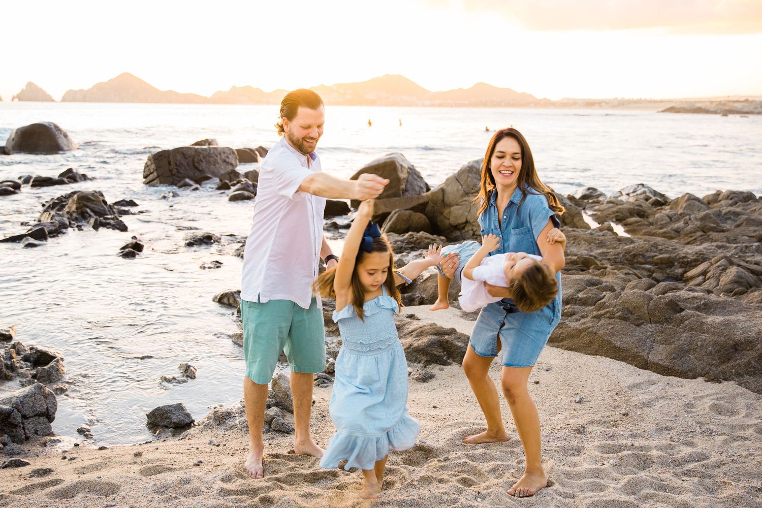 family  on beach in Cabo San Lucas