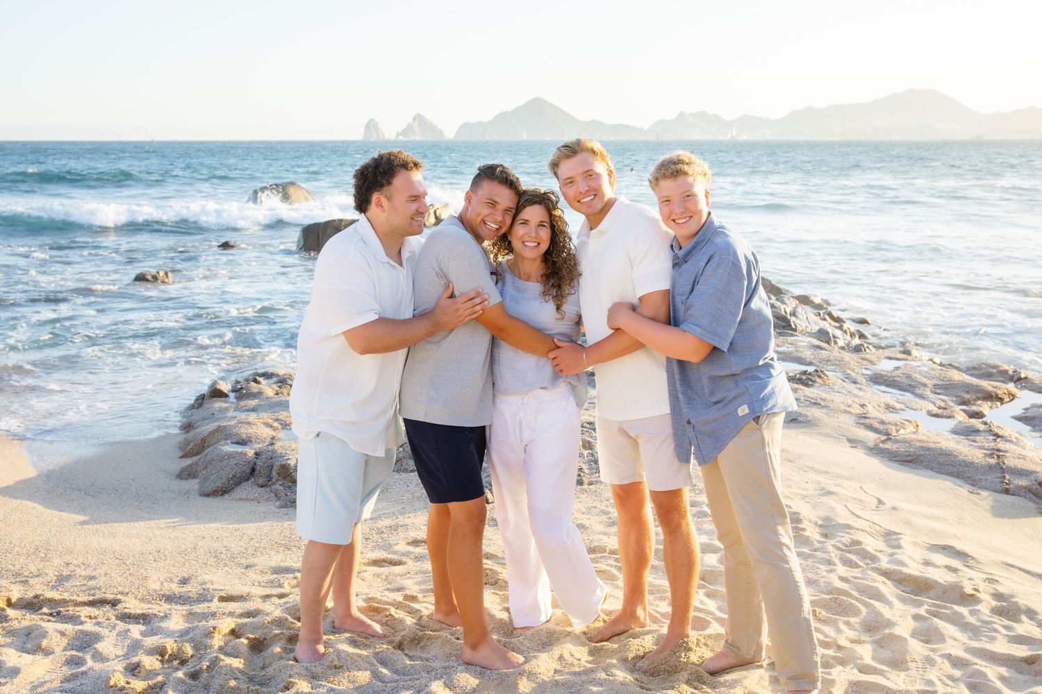 family on beach in Cabo San Lucas