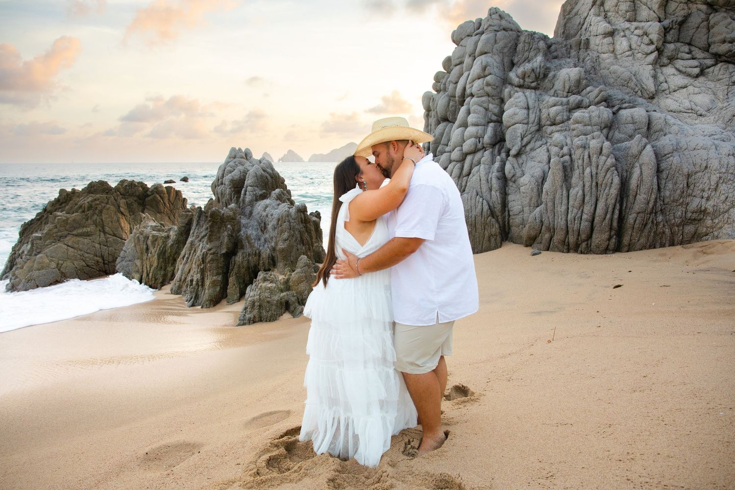 engaged couple on beach in Cabo San Lucas