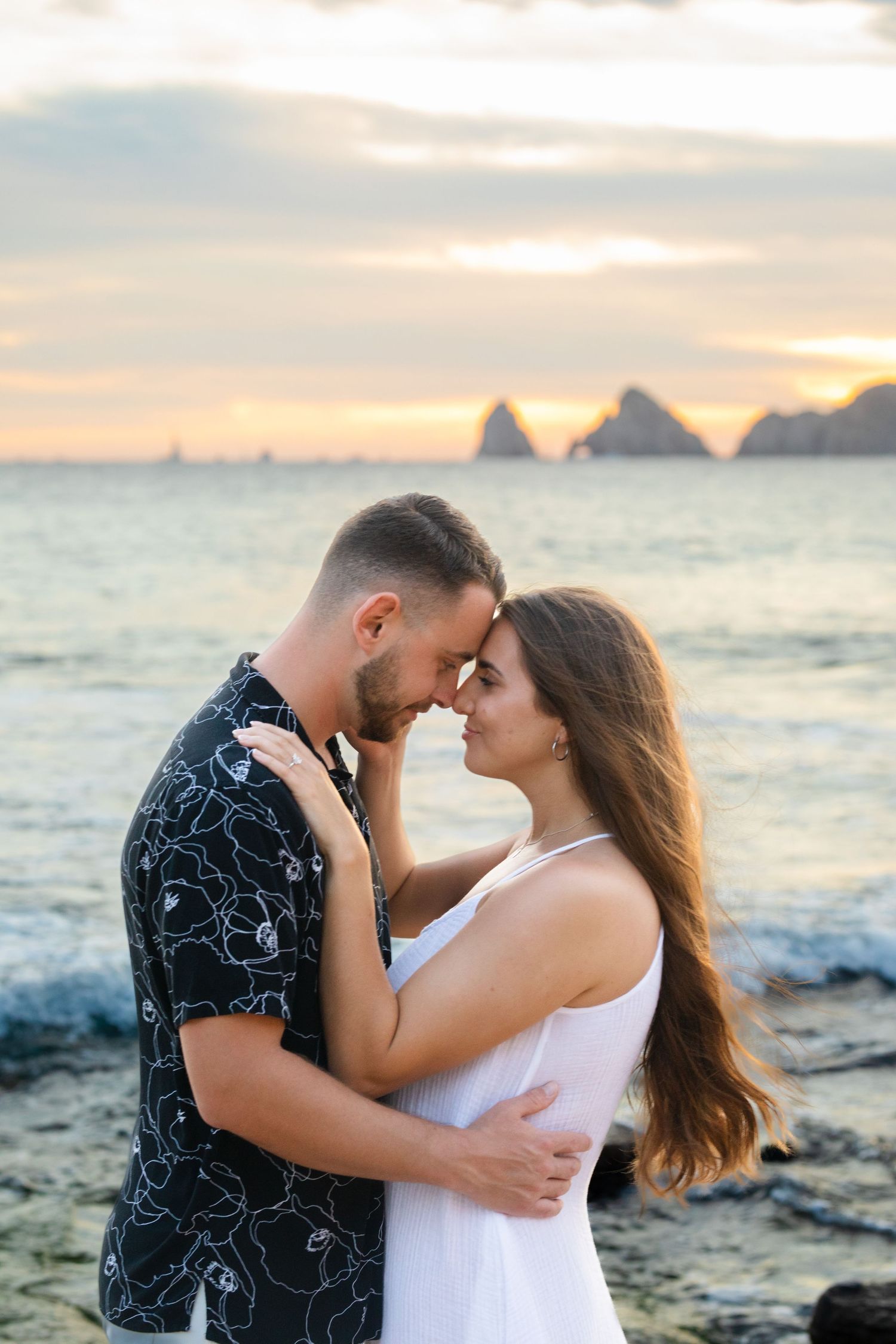 engaged couple on beach in Cabo San Lucas