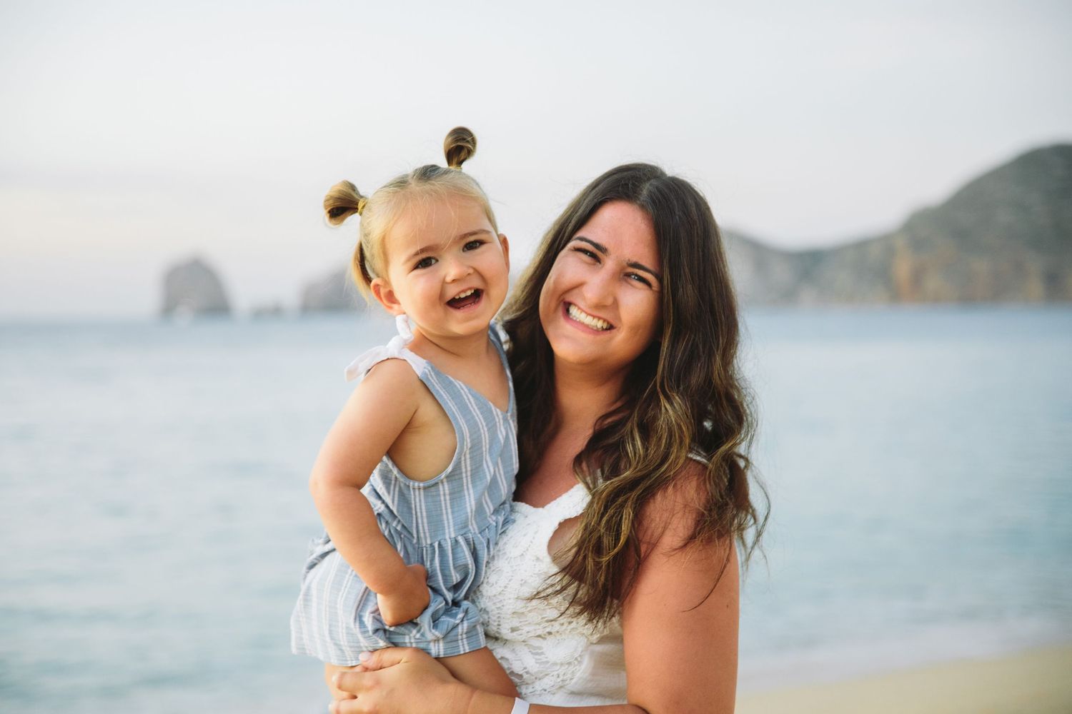 mother and daughter on beach in Cabo San Lucas