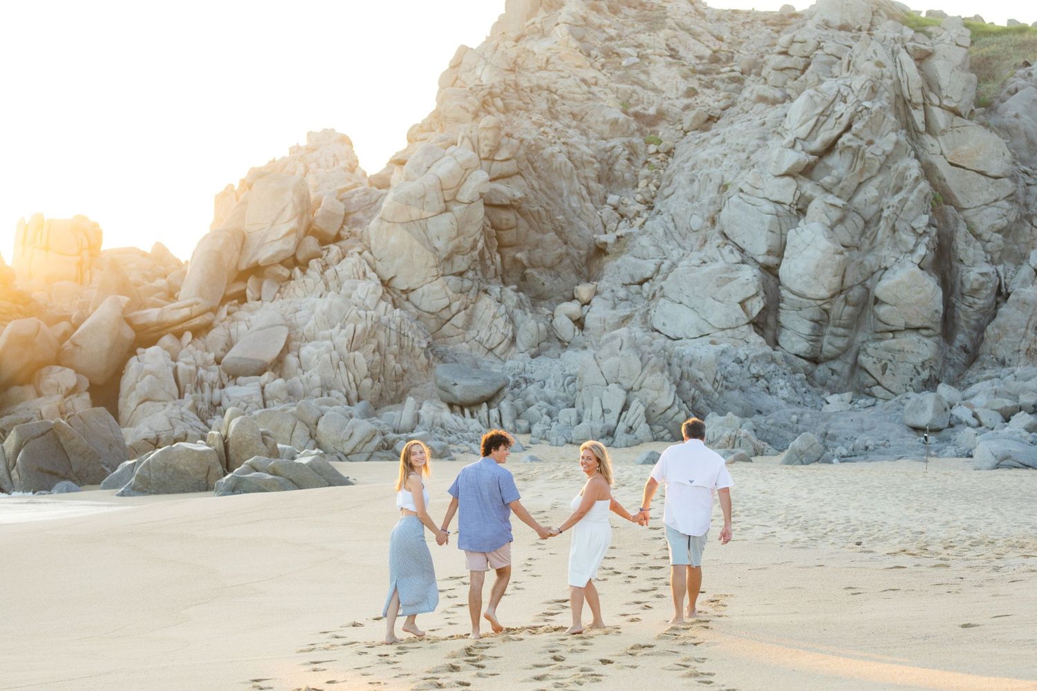 family  on beach in Cabo San Lucas