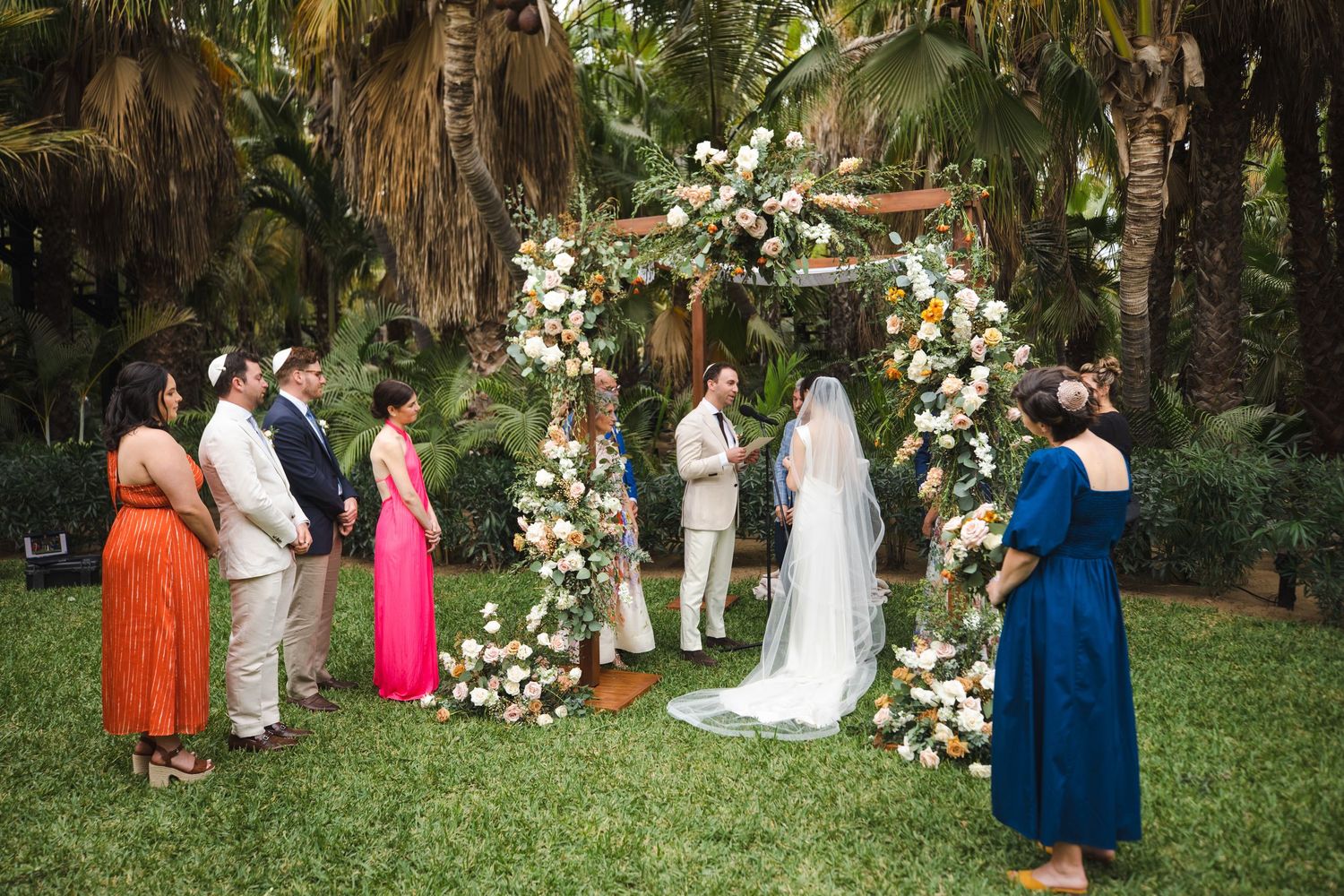 jewish bride and groom kissing during intimate ceremony in Cabo at ACRE Resort