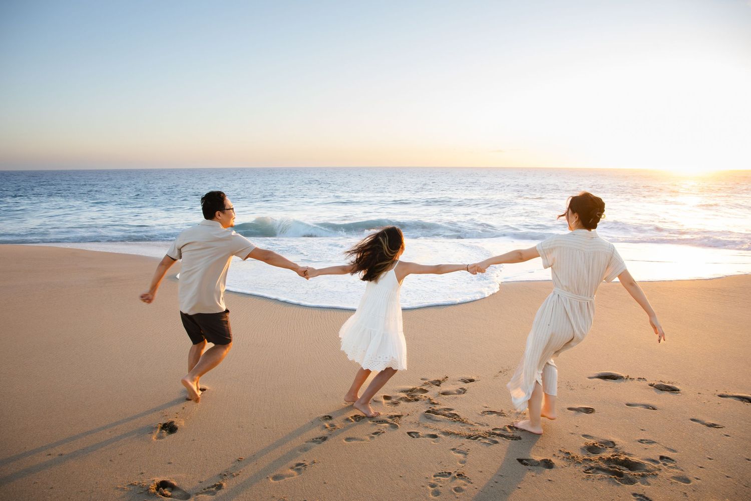 family  on beach in Cabo San Lucas