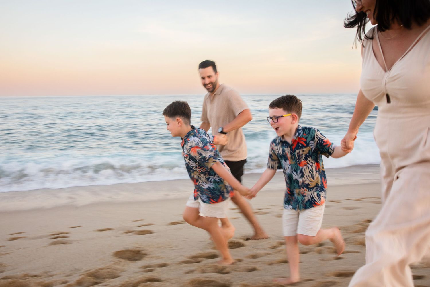 family  on beach in Cabo San Lucas