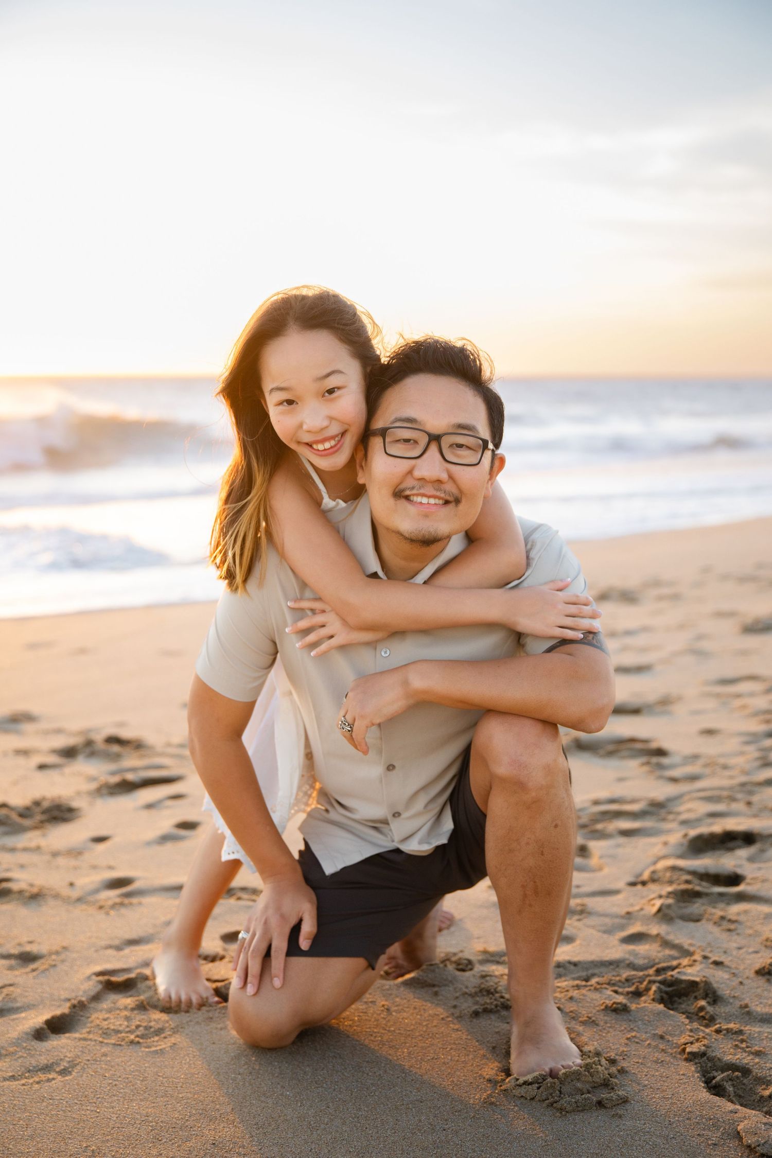 dad and daughter on beach in Cabo San Lucas