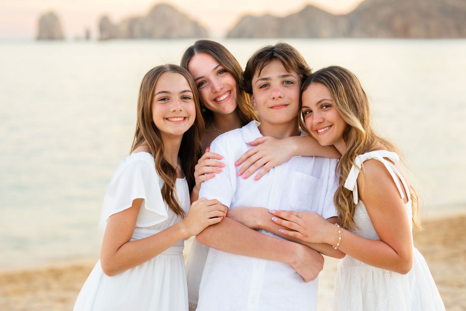 family  on beach in Cabo San Lucas
