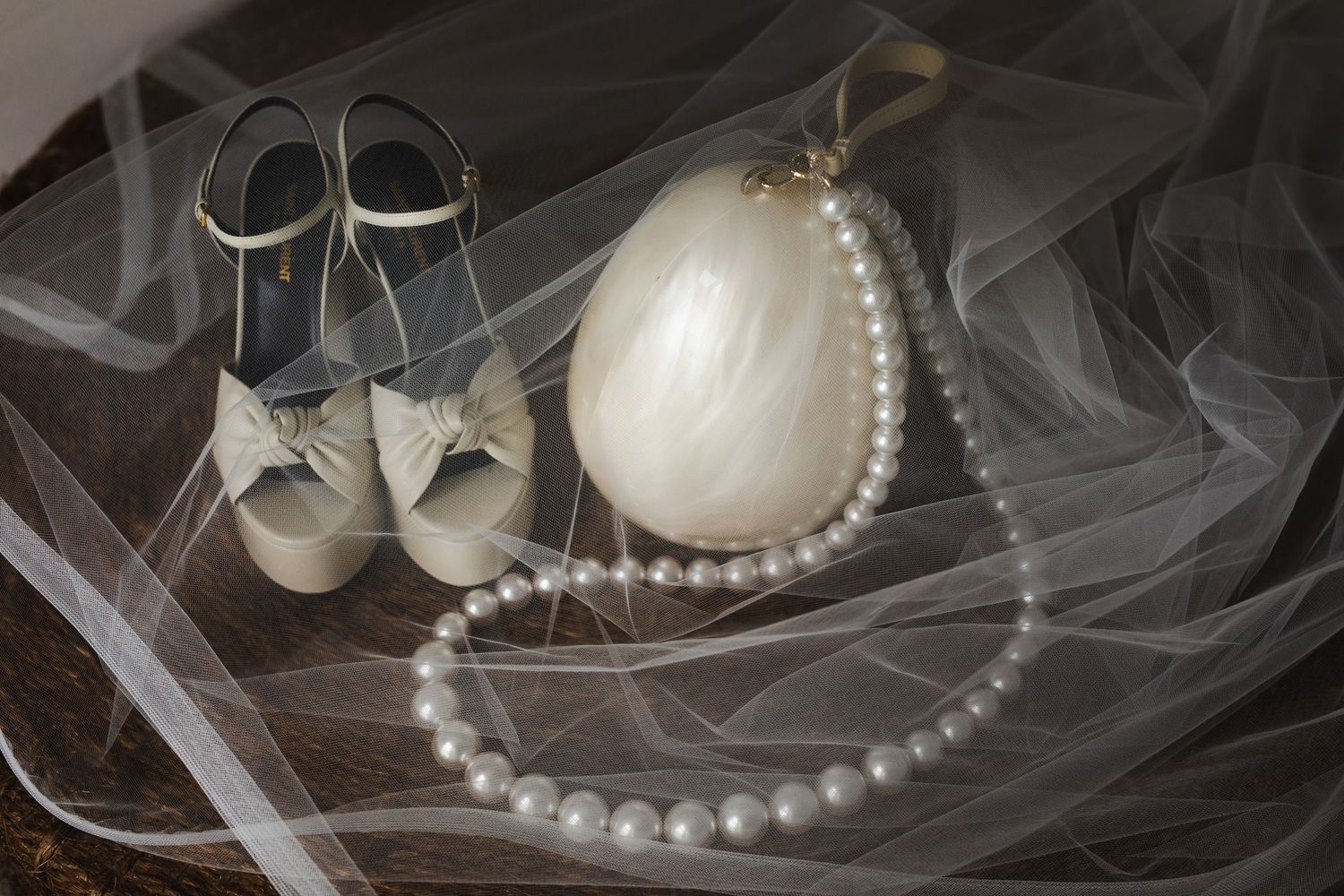 brides getting ready details, purse and shoes for intimate wedding at ACRE Resort in Cabo