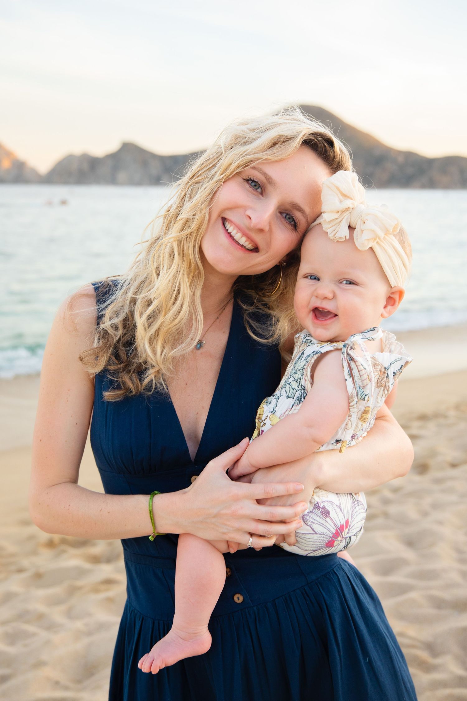 mother and daughter on beach in Cabo San Lucas