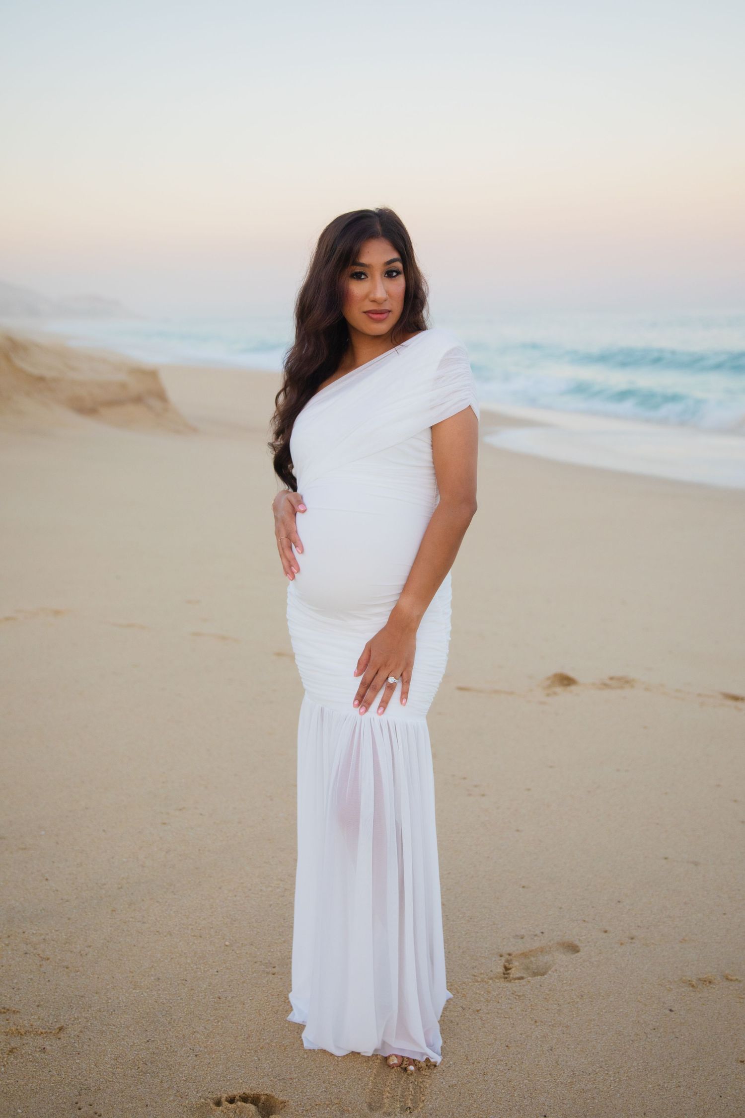 pregnant woman on beach in Cabo San Lucas