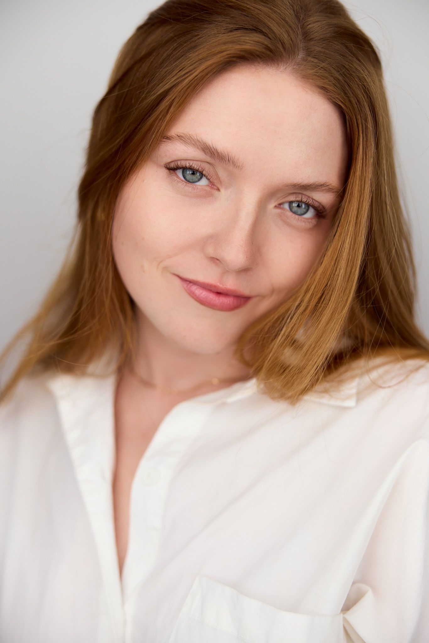 A series of five portrait photos showing someone with blonde hair and a white top against a light background.