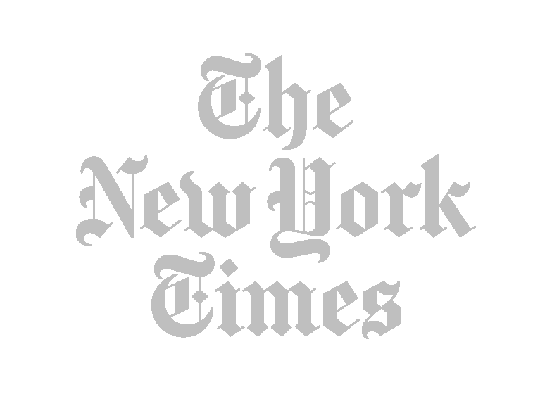 The New York Times logo displayed in light gray on a white background.
