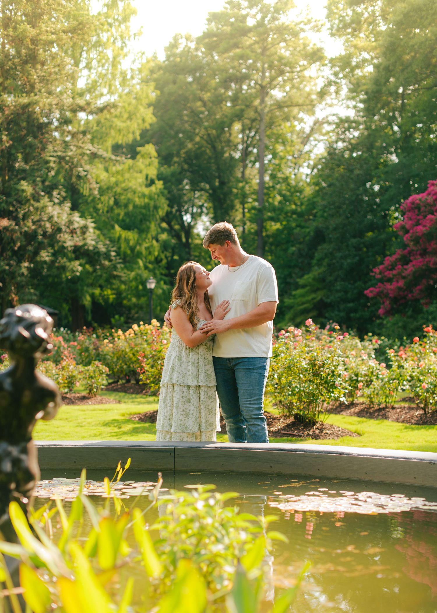 Engagement couples photoshoot at Raleigh Rose Garden North Carolina during golden hour