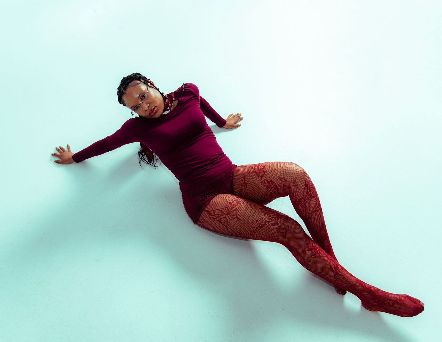 modest boudoir photogaphy by raleigh north carolina photographer. red outfit with tights
