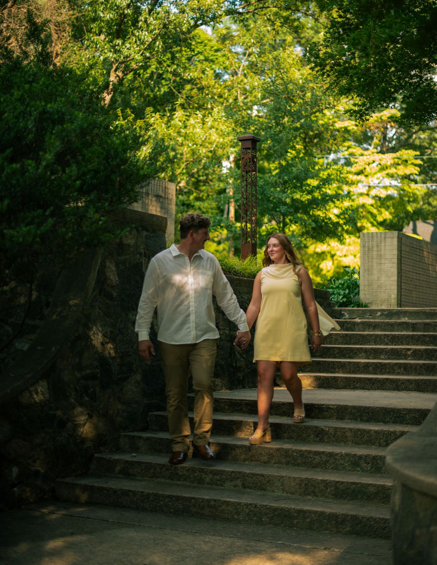 Engagement couples photoshoot at Raleigh Rose Garden North Carolina during golden hour