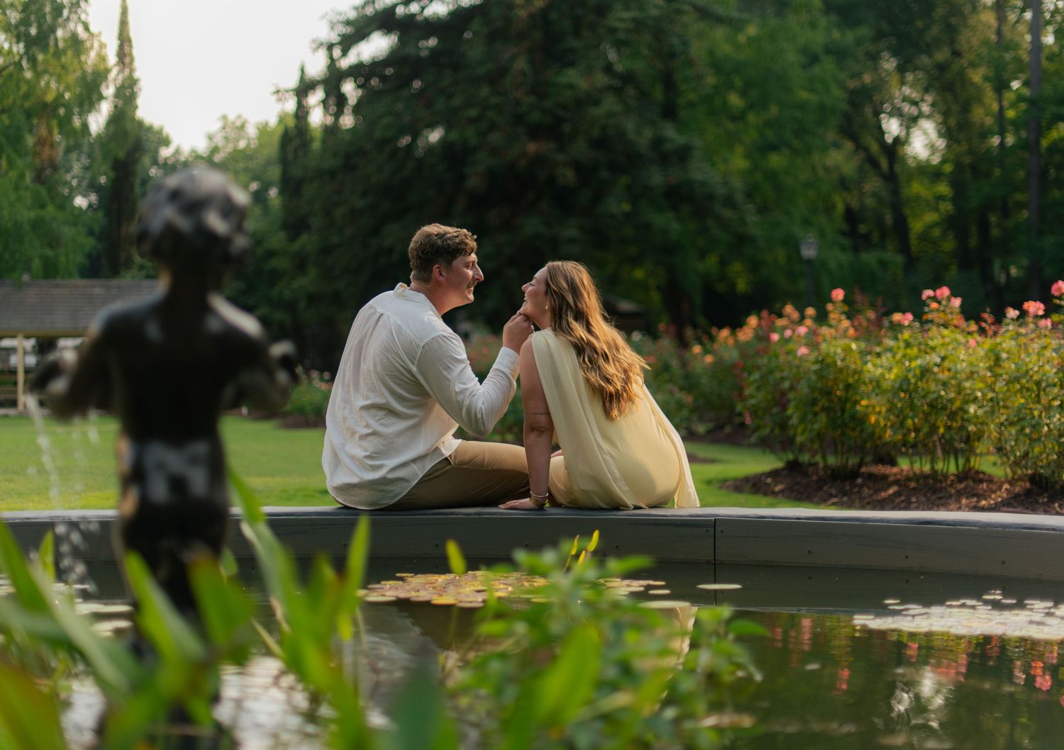 Engagement couples photoshoot at Raleigh Rose Garden North Carolina during golden hour