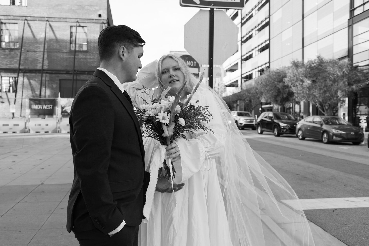Cinematic engagement Elopement photos in the city Downtown Raleigh, NC
