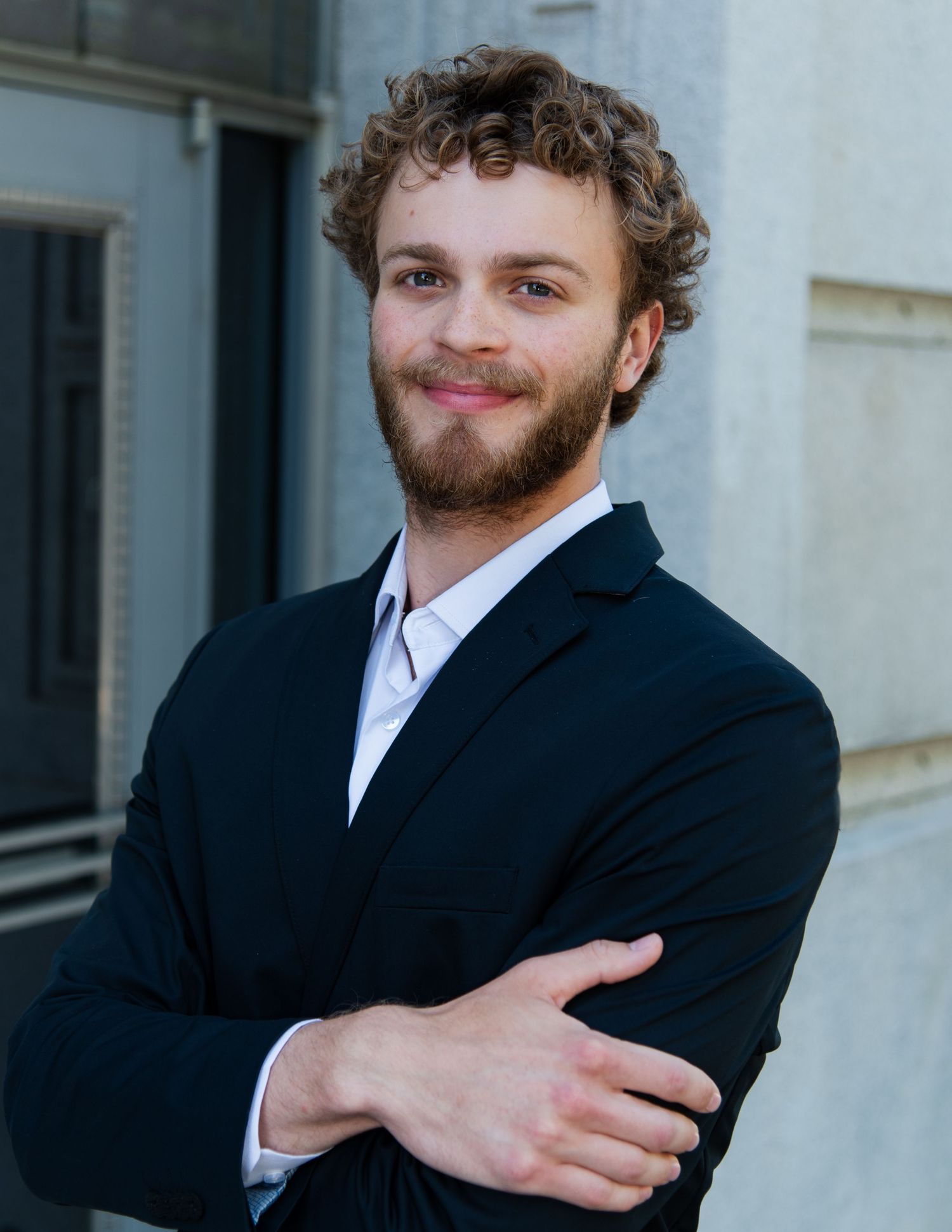 Professional male headshot photography outdoors professional building downtown raleigh, nc