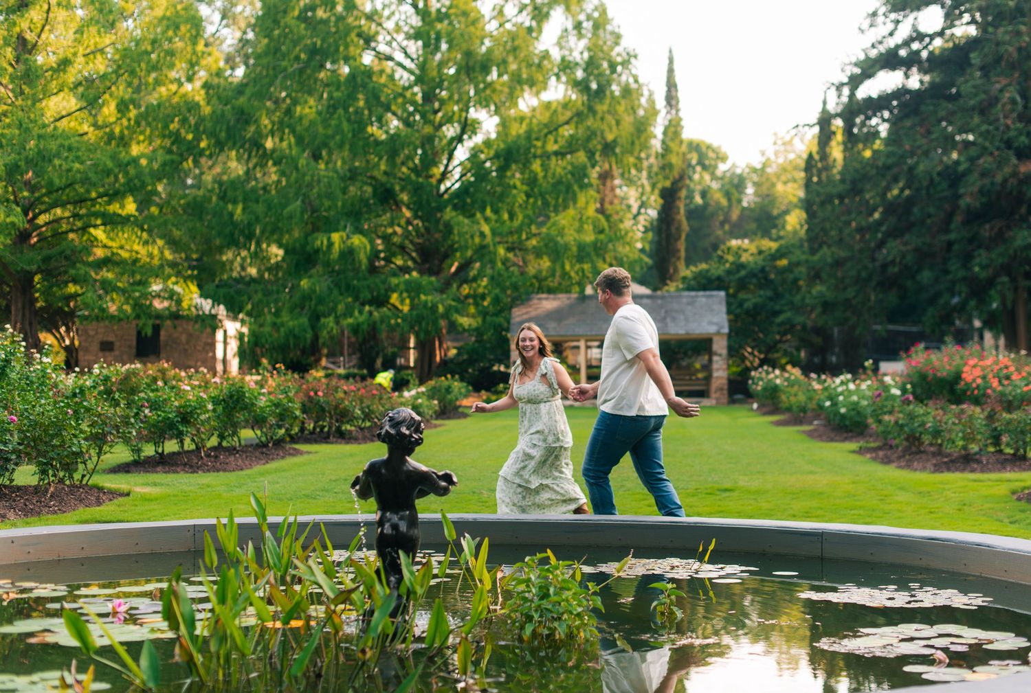 Engagement couples photoshoot at Raleigh Rose Garden North Carolina during golden hour