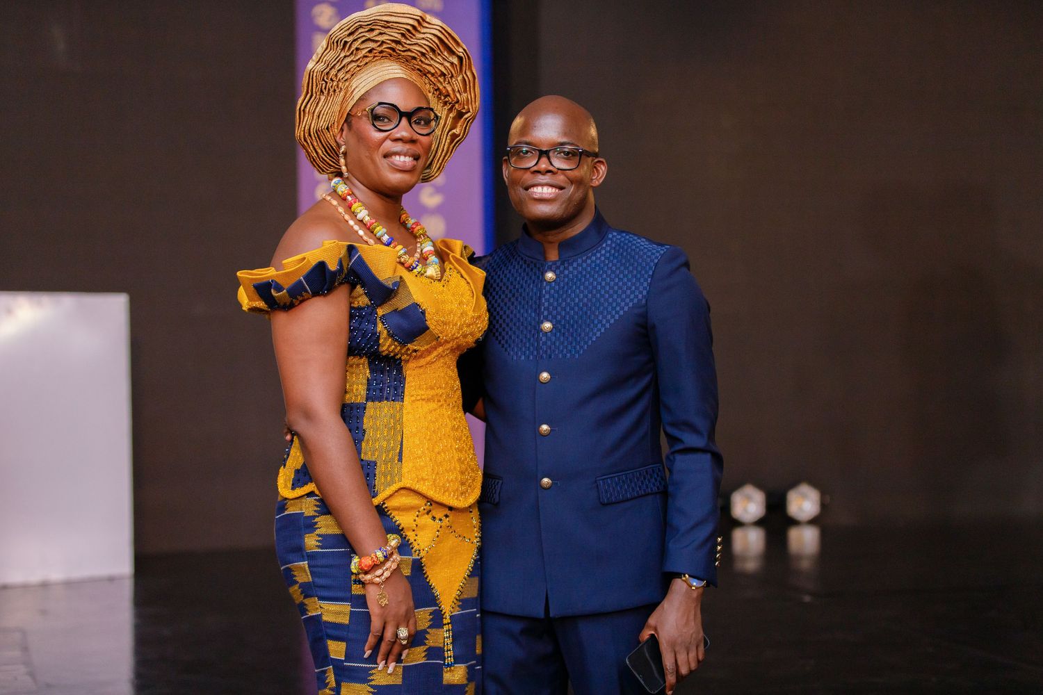 Candid moment from a corporate event in Accra photographed by The BLUEshutter.
