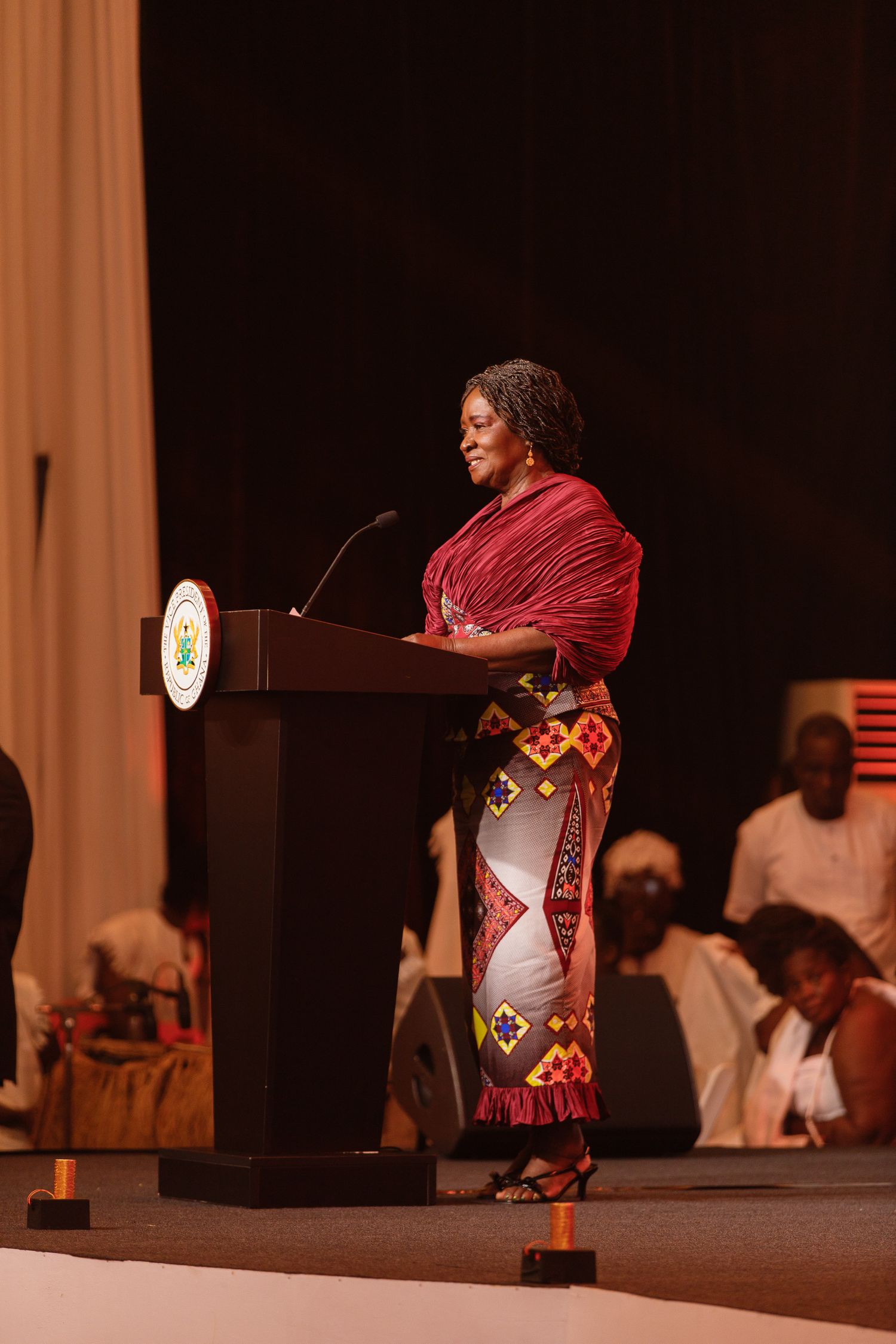 Candid moment from a corporate event in Accra photographed by The BLUEshutter.