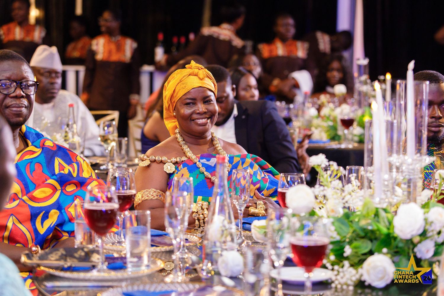 Candid moment from a corporate event in Accra photographed by The BLUEshutter.