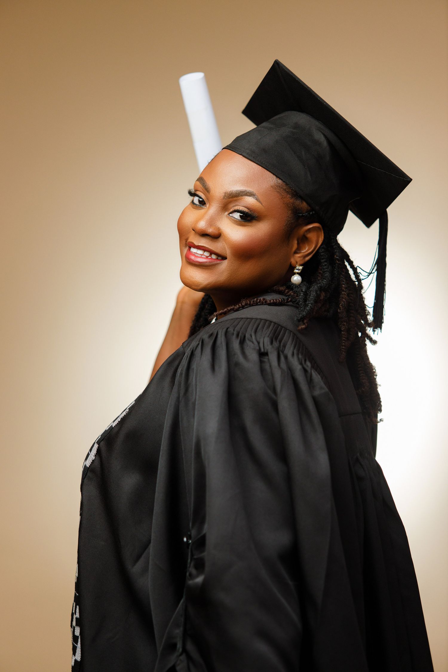 Graduation portrait in Accra by The BLUEshutter, Ghanaian female photographer.