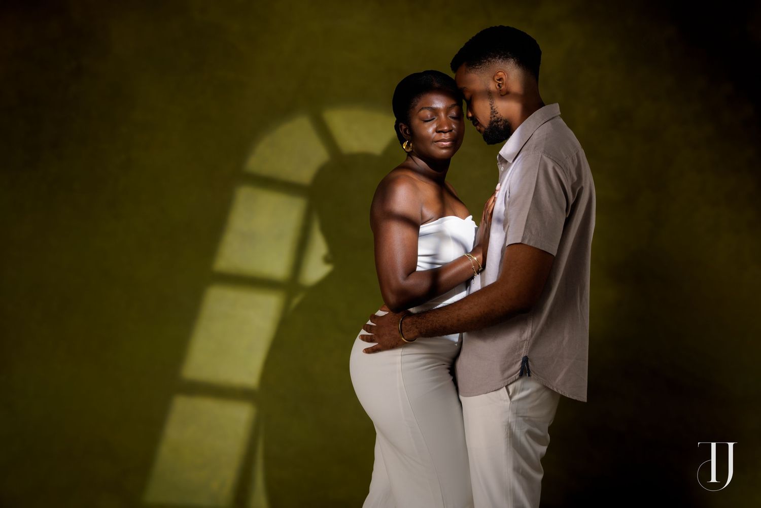 Romantic pre-wedding portrait of couple in Accra, Ghana