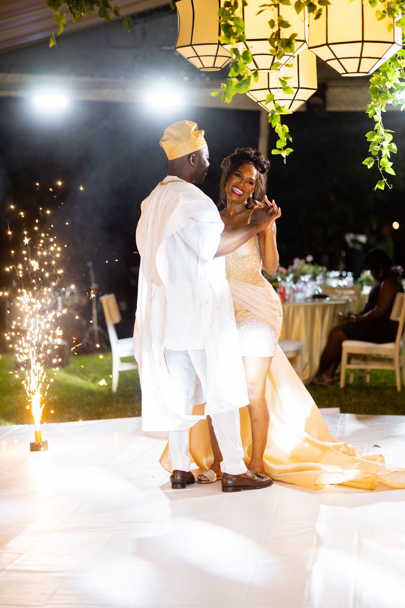 Bride and groom sharing their first dance at wedding reception