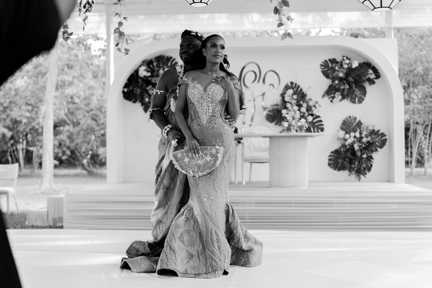 Luxury wedding portrait of bride and groom  with duck in Safari valley, Ghana