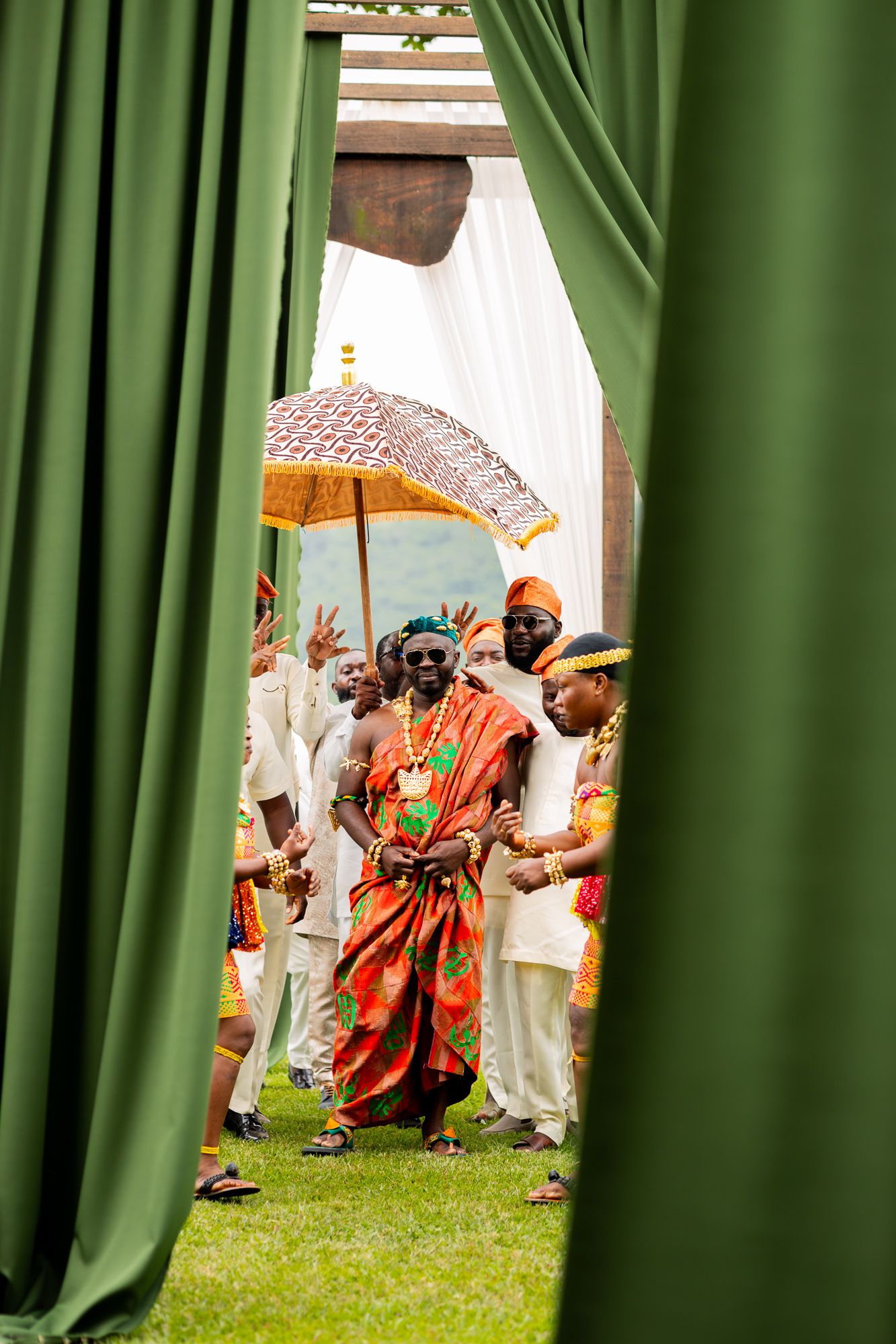 Groom making his entrance at wedding ceremony in Accra