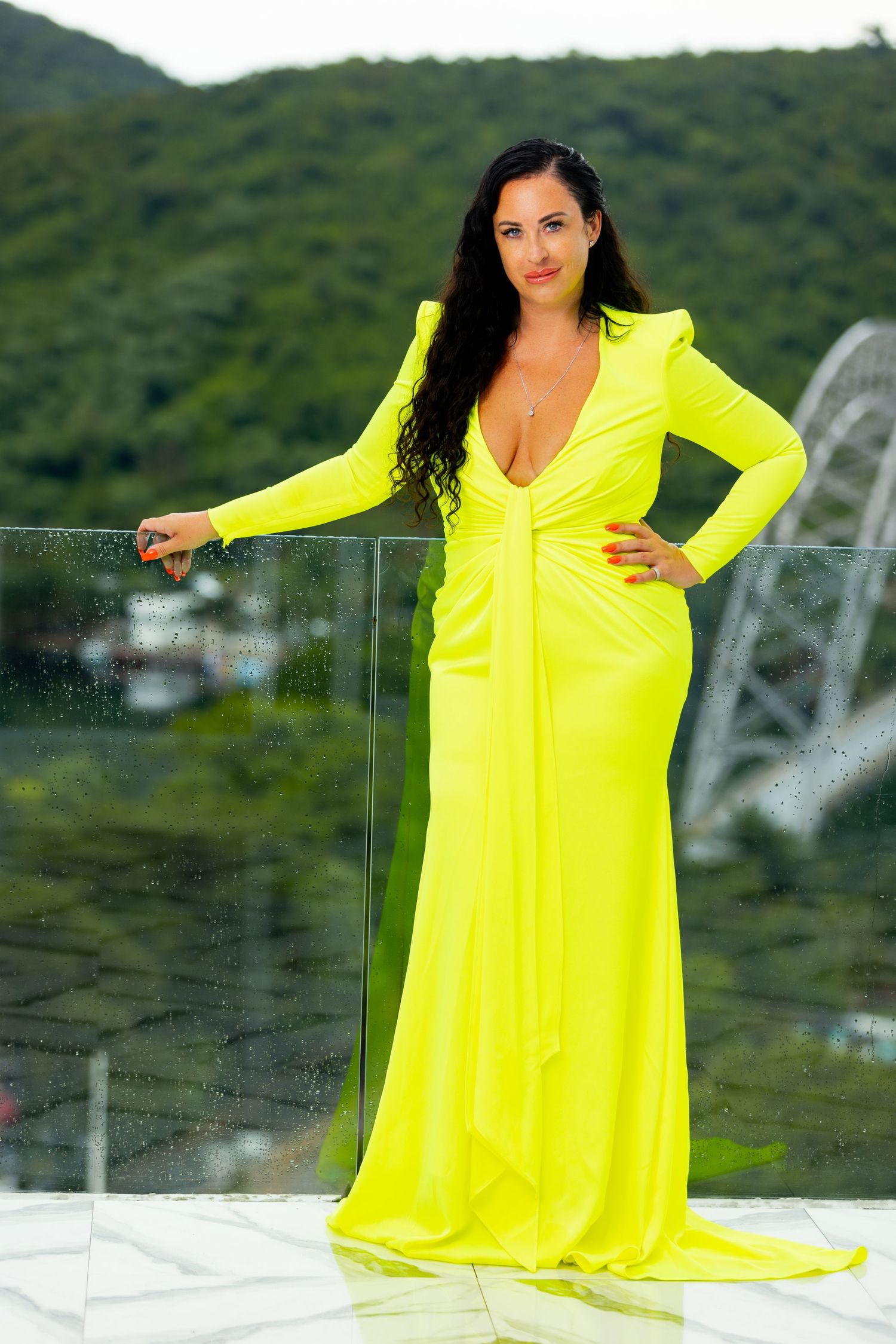 Natural light portrait with greenery in the background