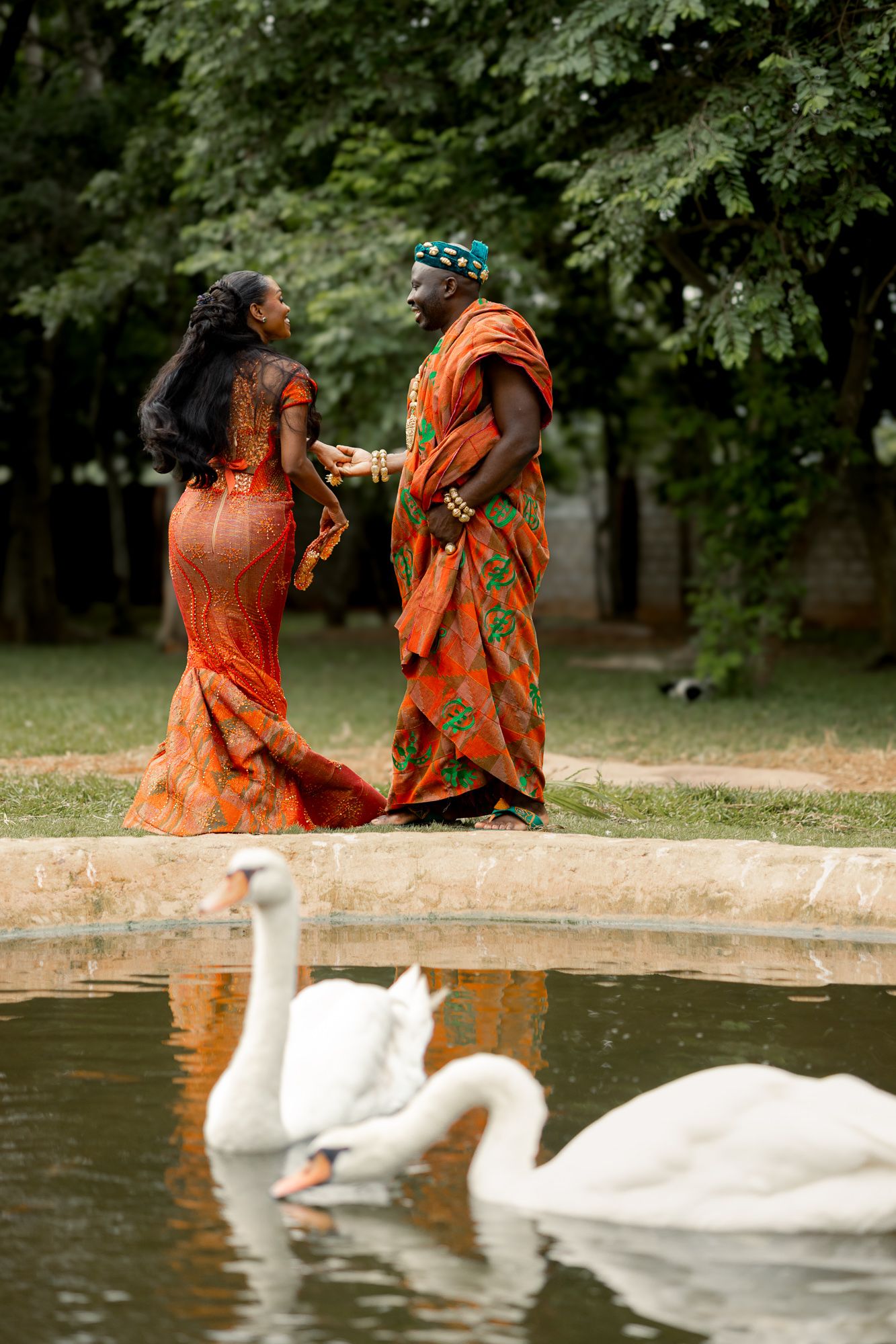 Luxury wedding portrait of bride and groom  with duck in Safari valley, Ghana