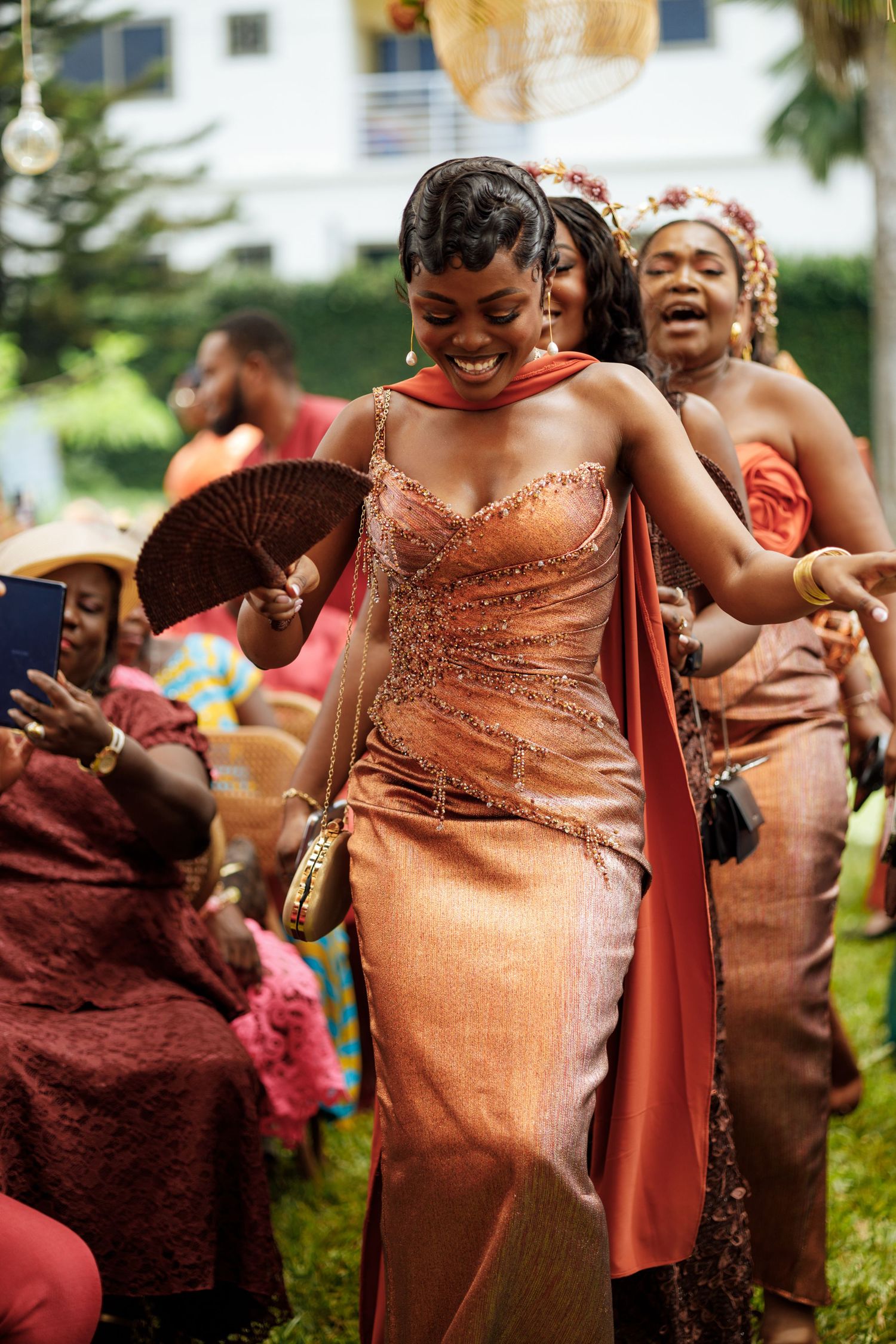 Bride and bridesmaids dancing at a Traditional wedding ceremony in Ghana