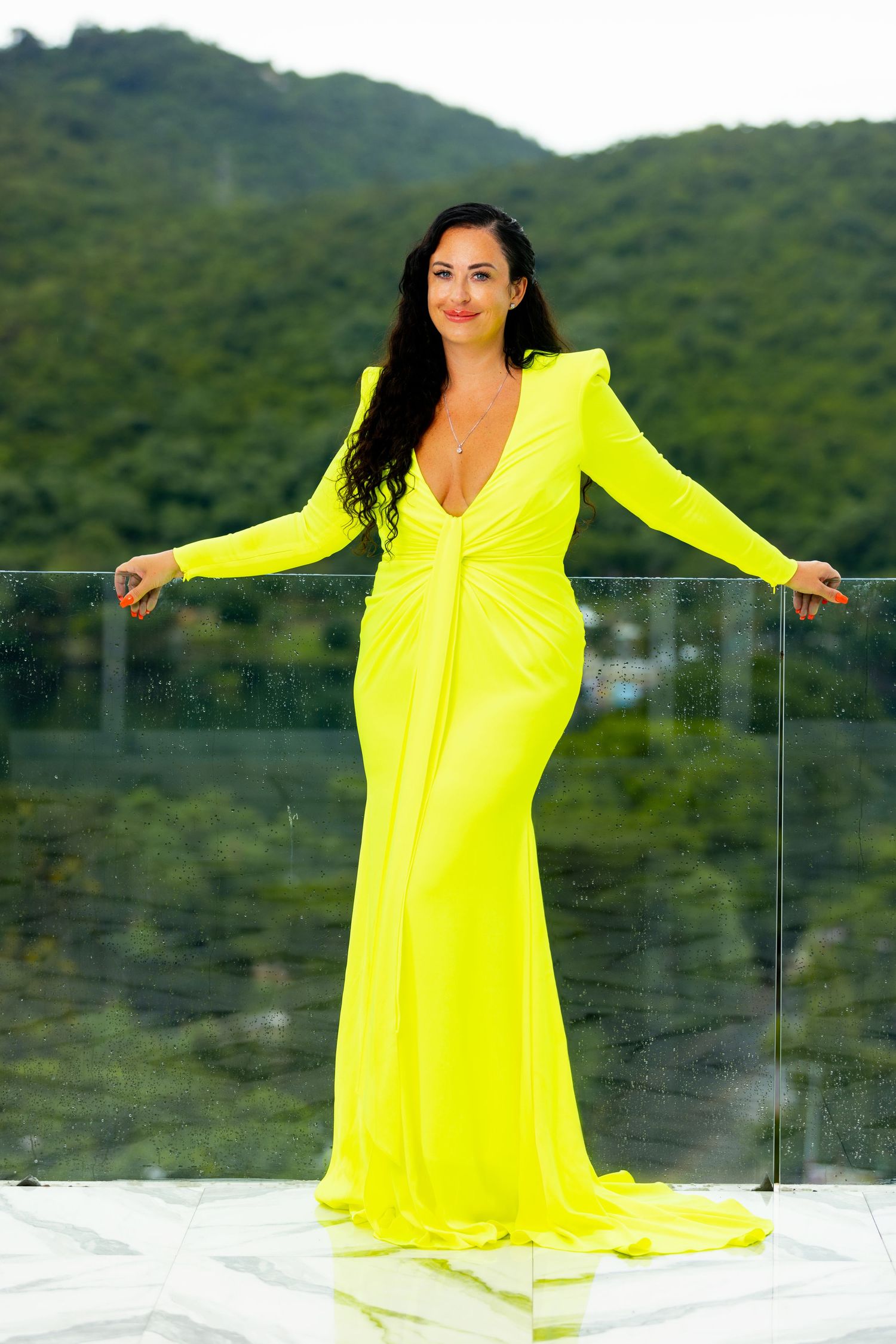 Natural light portrait with greenery in the background