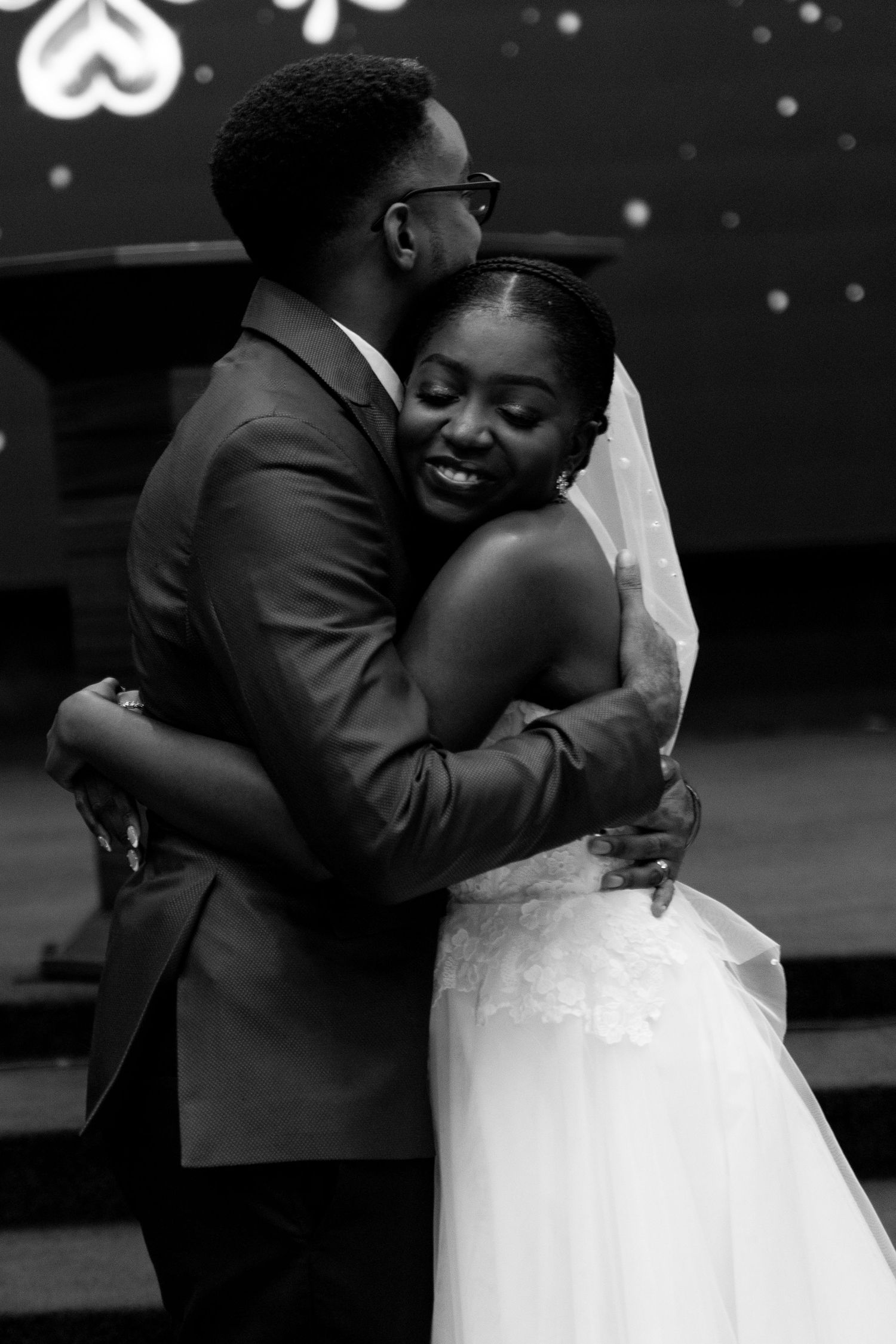 Candid moment of couple laughing during wedding