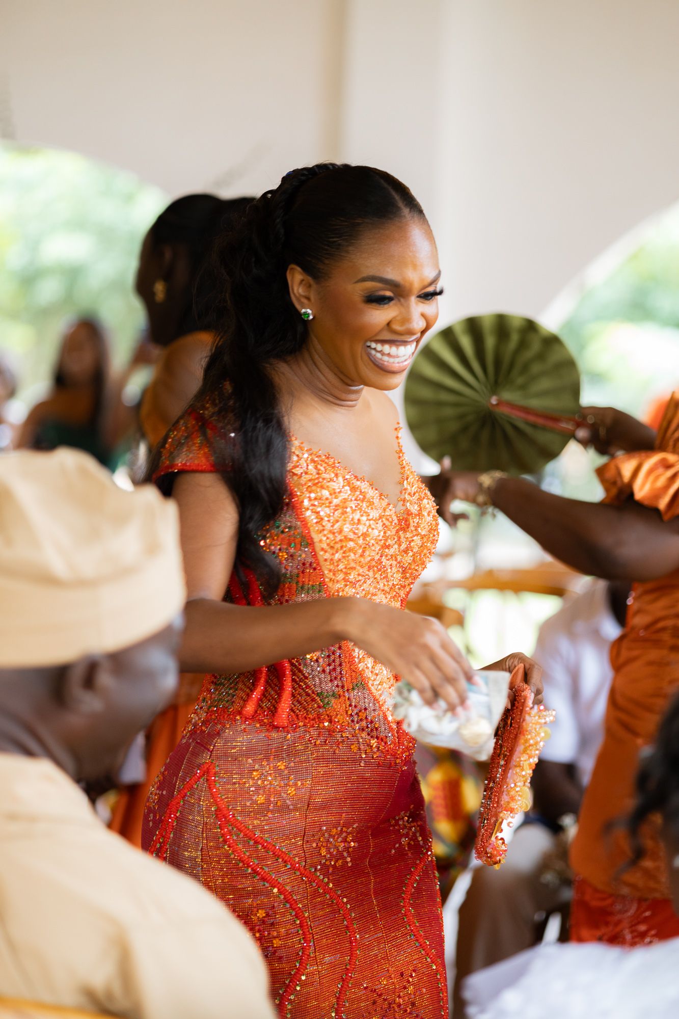 Bride dancing with family during traditional marriage celebration