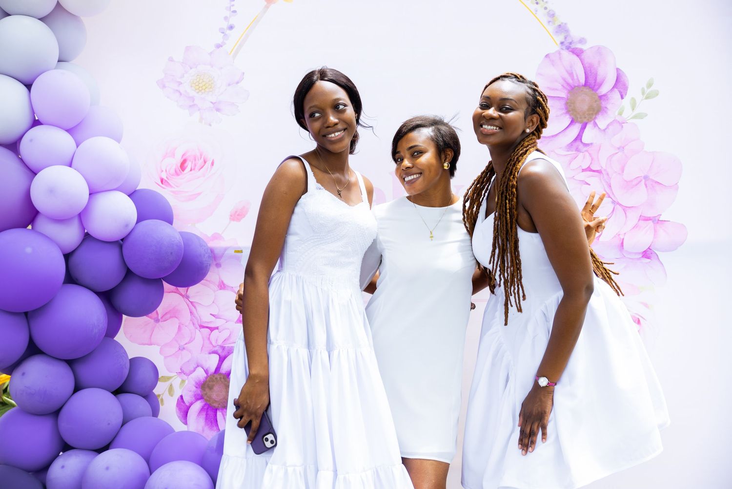 Baby surrounded by family at naming celebration reception