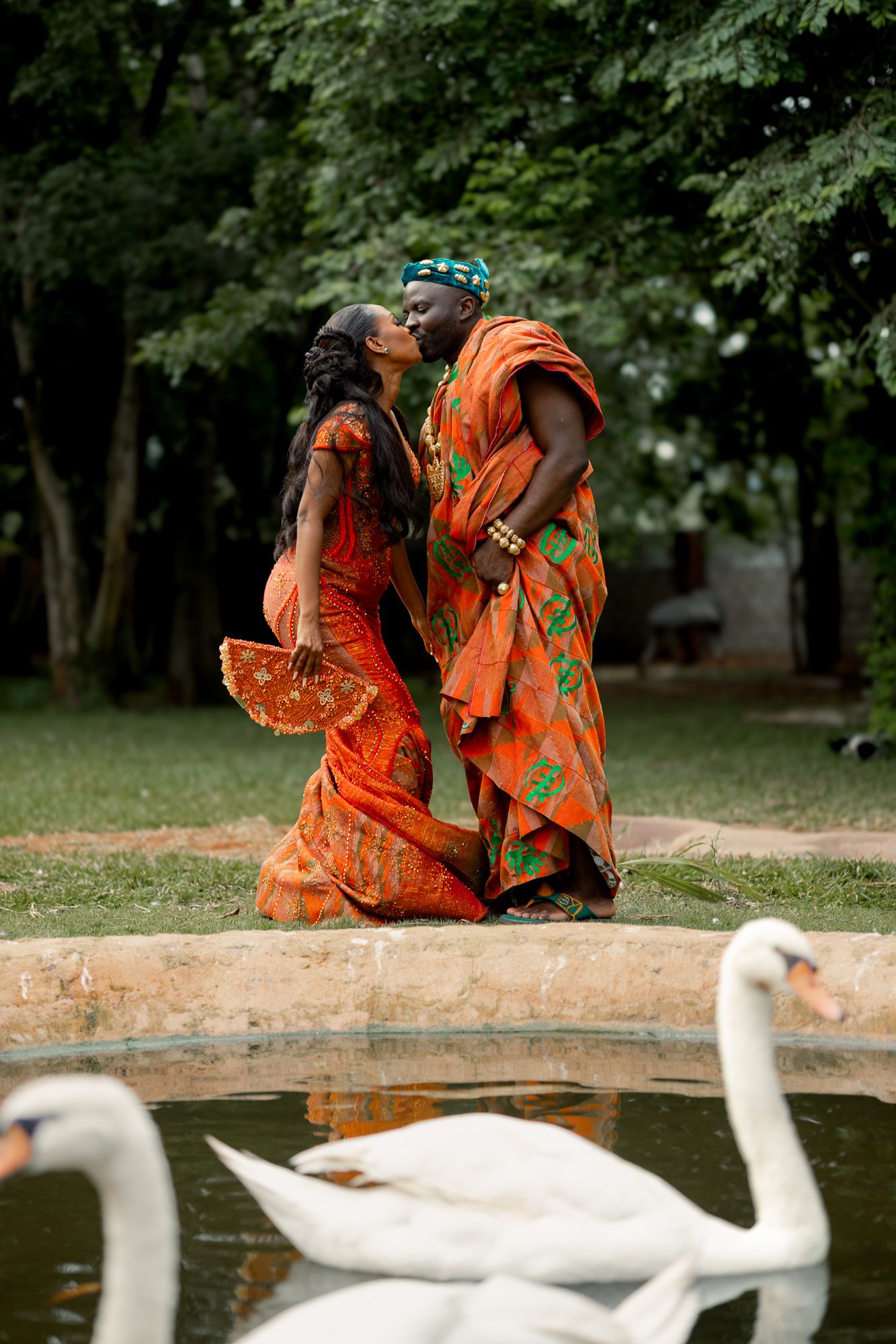 Luxury wedding portrait of bride and groom  with duck in Safari valley, Ghana