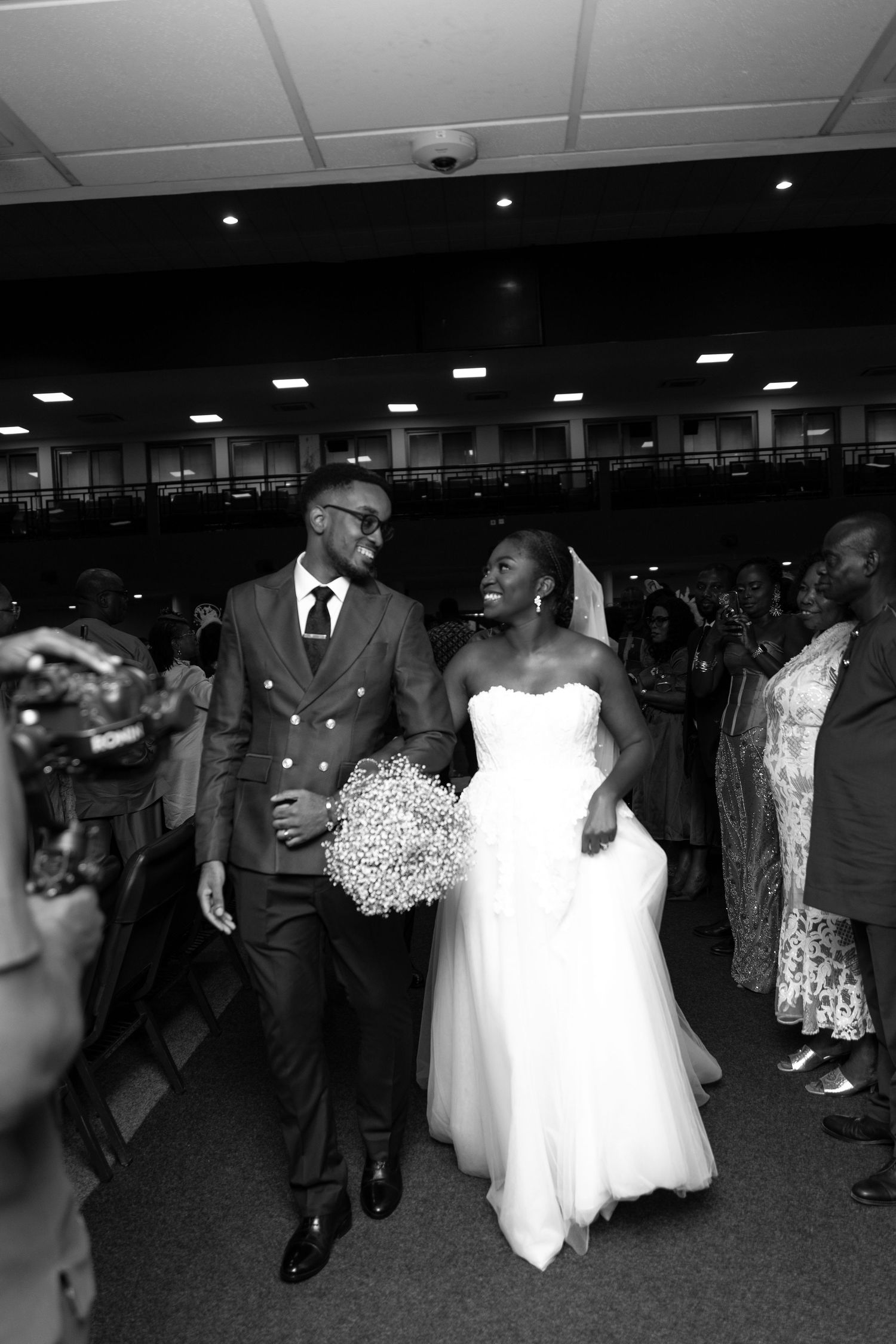 Bride and groom walking down the aisle after wedding ceremony