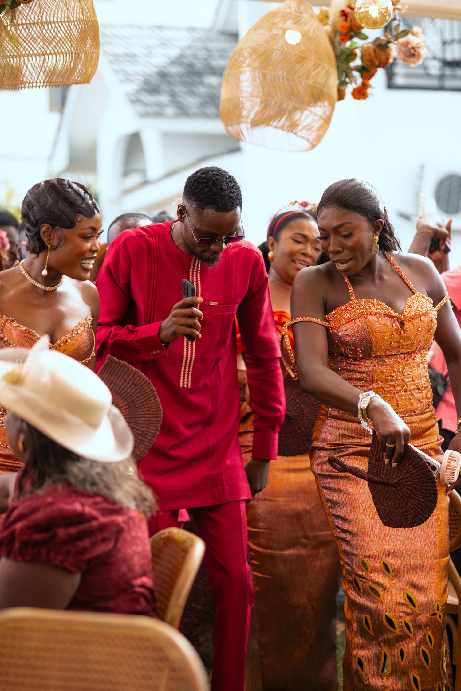Bride and bridesmaids dancing at a Traditional wedding ceremony in Ghana