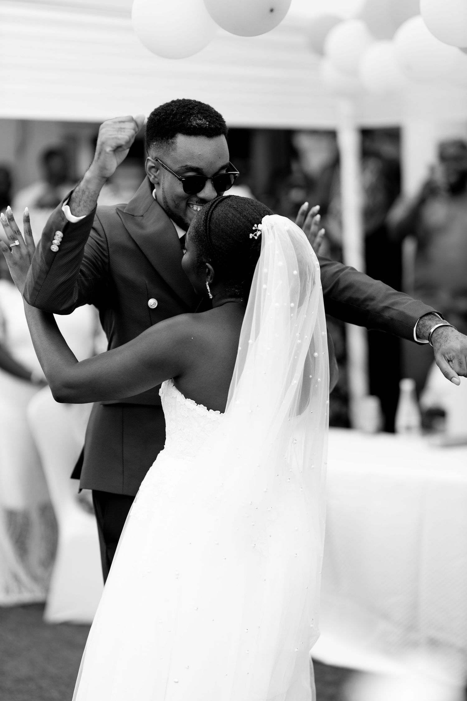 Romantic bride and groom dancing at a wedding in Ghana