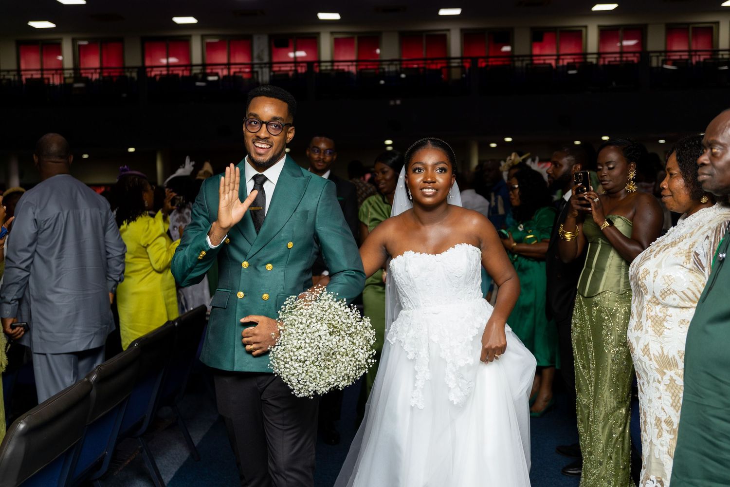 Bride and groom walking down the aisle after wedding ceremony