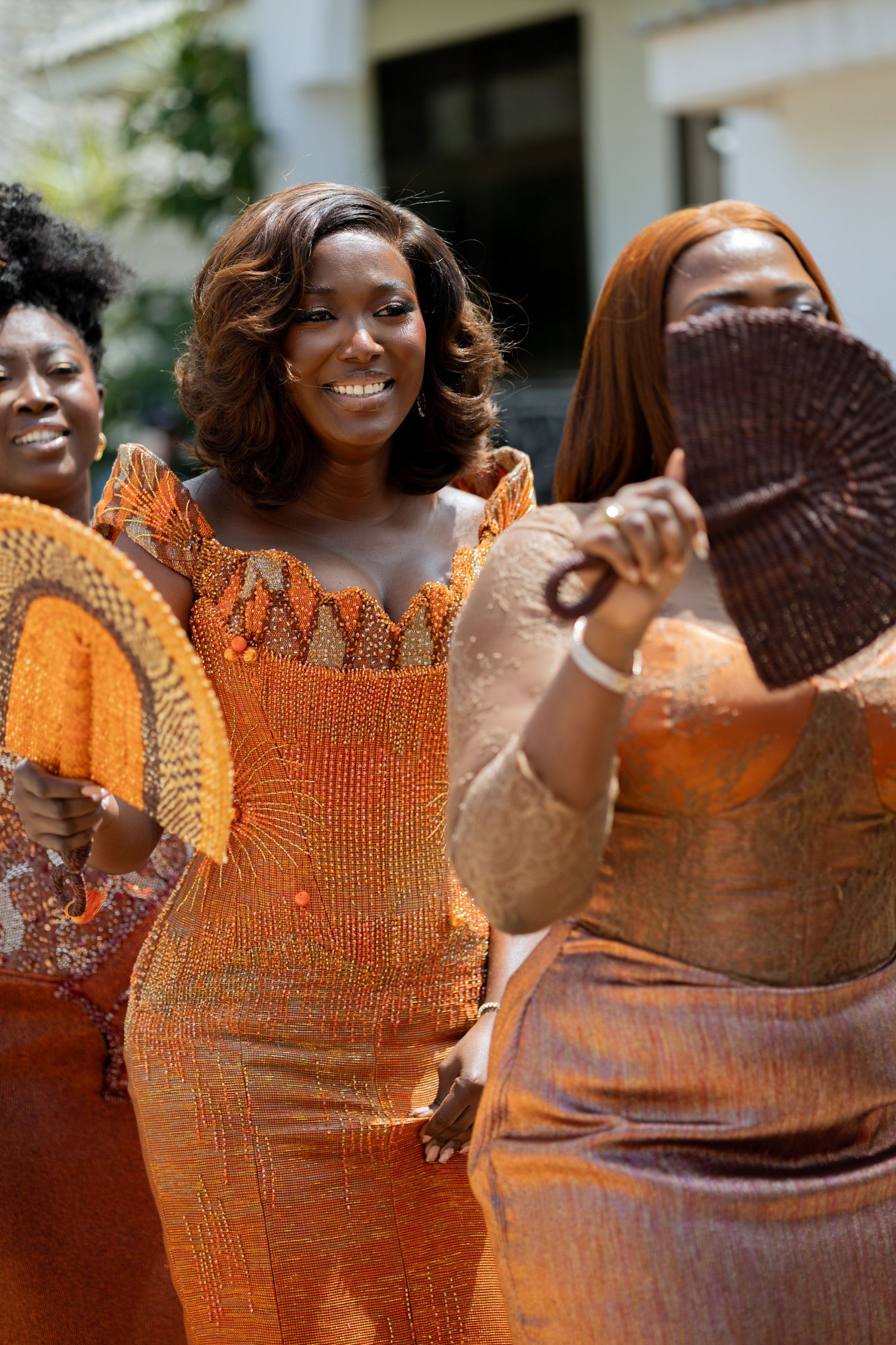Bride and bridesmaids dancing at a Traditional wedding ceremony in Ghana