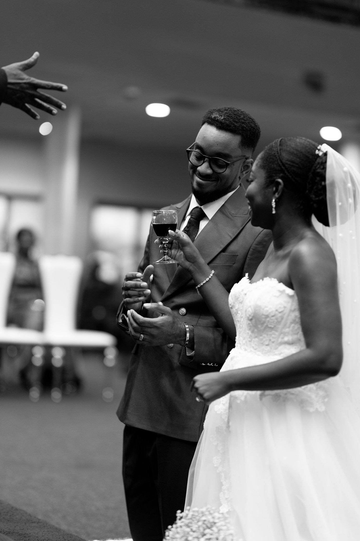 Candid moment of couple laughing during wedding shoot