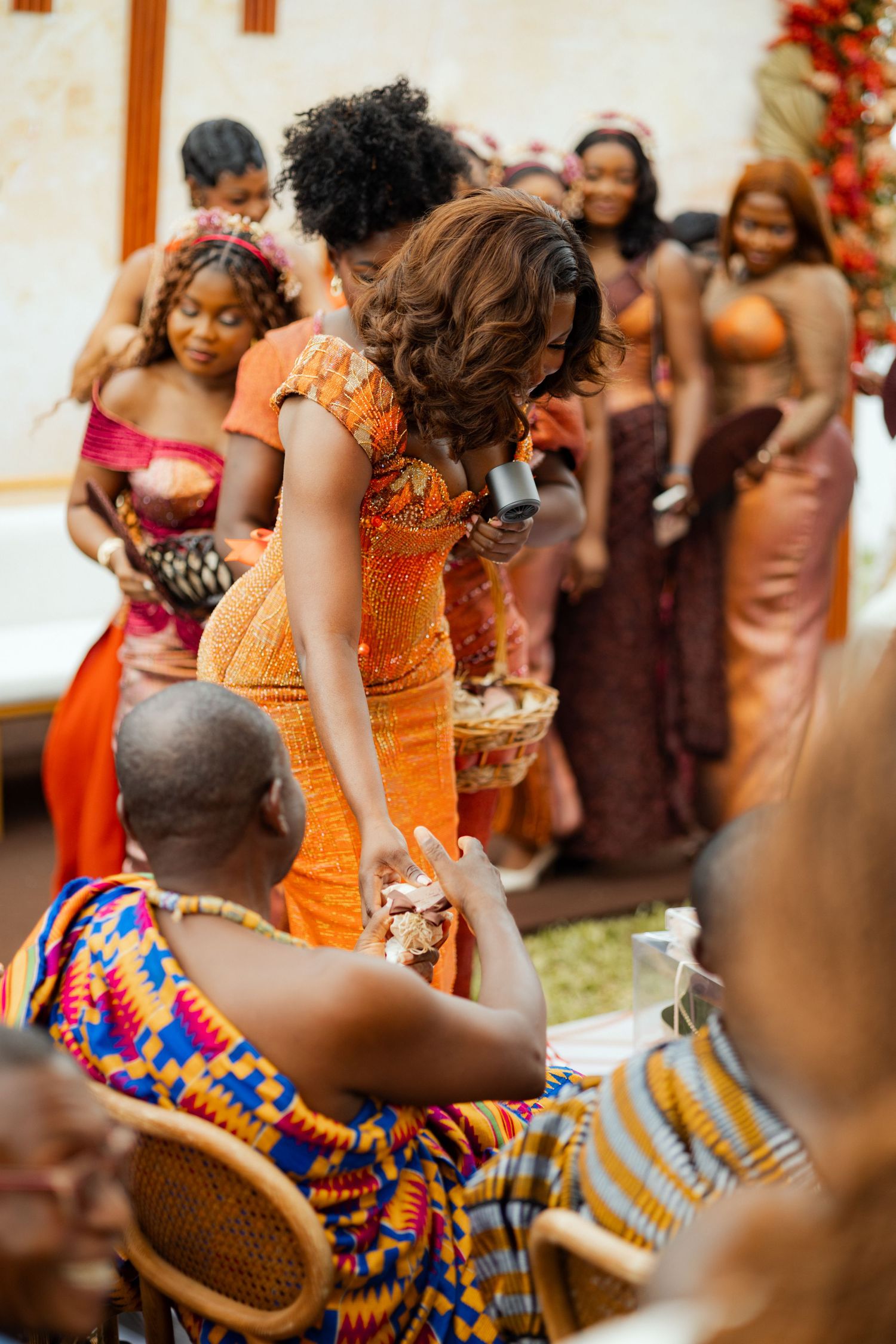 Bride and bridesmaids dancing at a Traditional wedding ceremony in Ghana