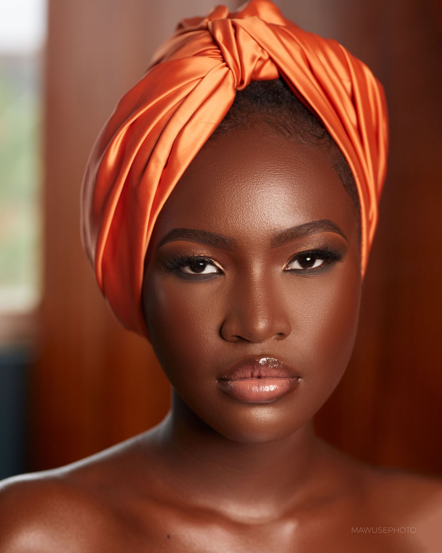 itorial-style portrait of model with bold makeup