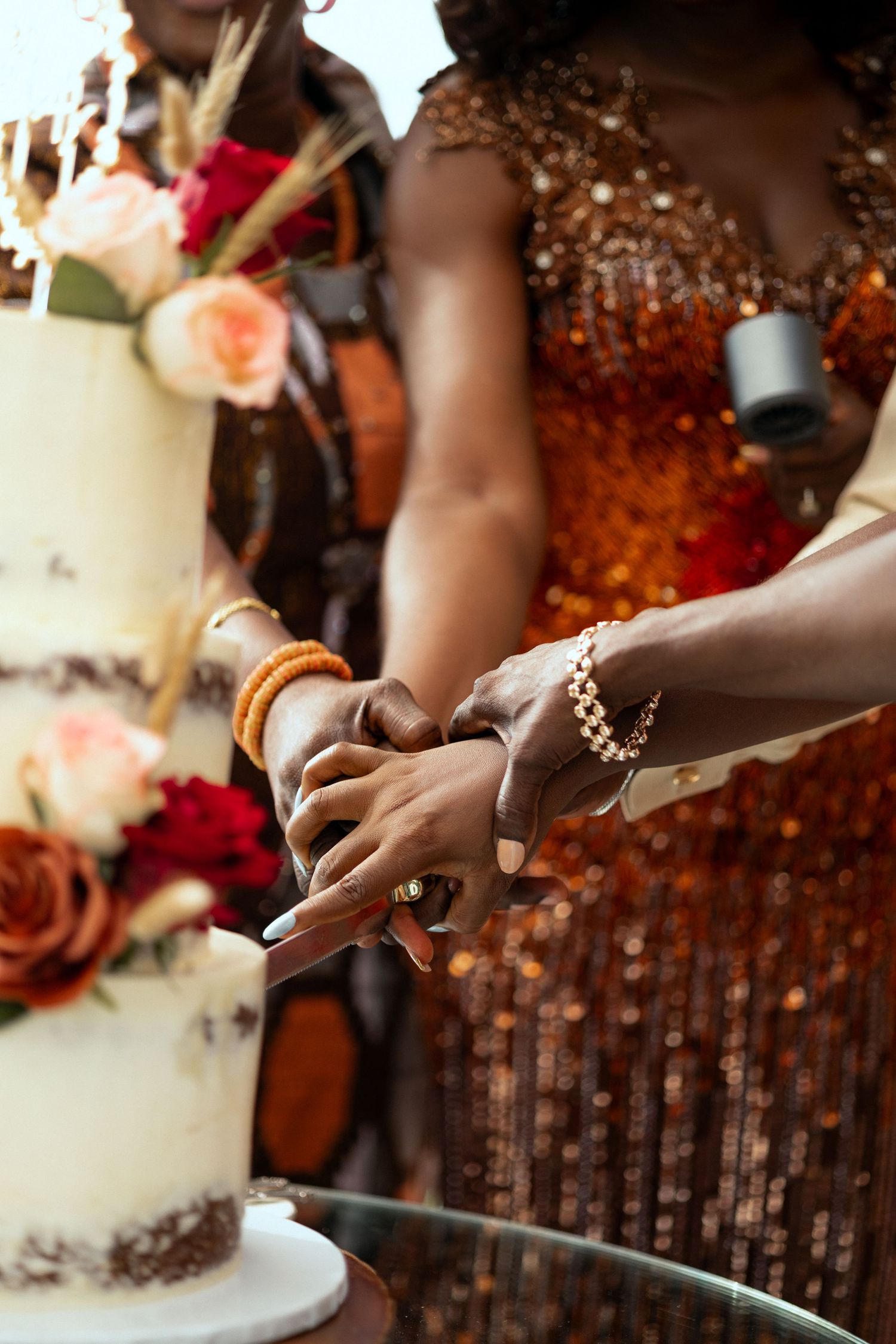 Beautiful Bride and groom cutting cake at Traditional wedding ceremony in Ghana